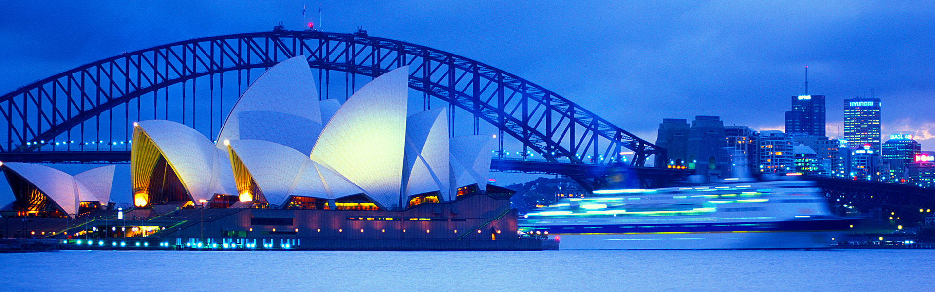 Sydney Opera Building, Harbour Bridge and passing cruise ship
